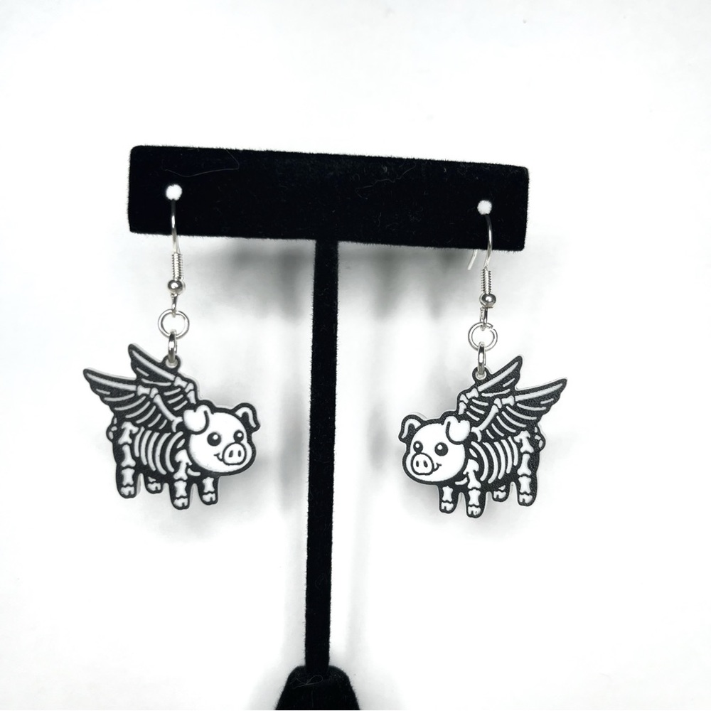 Flying Pig Skeleton Earrings in Black and White